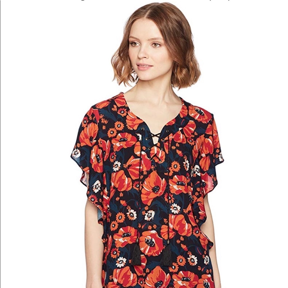 Short Flutter Sleeve Lace Up Top.
